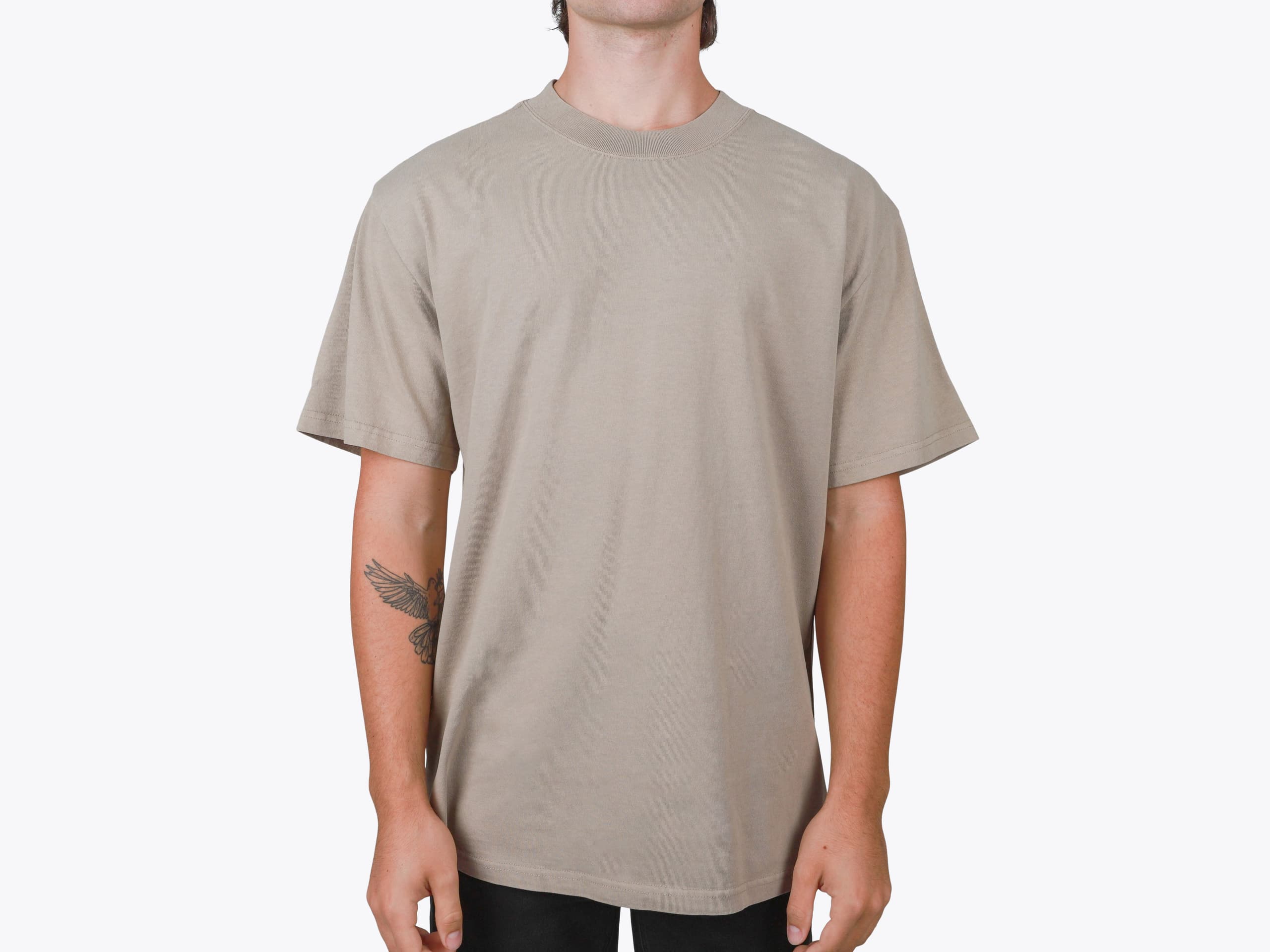AS Colour 5082 Men's Heavy Faded Tee in Faded Khaki (model:male, size:medium, view:front)