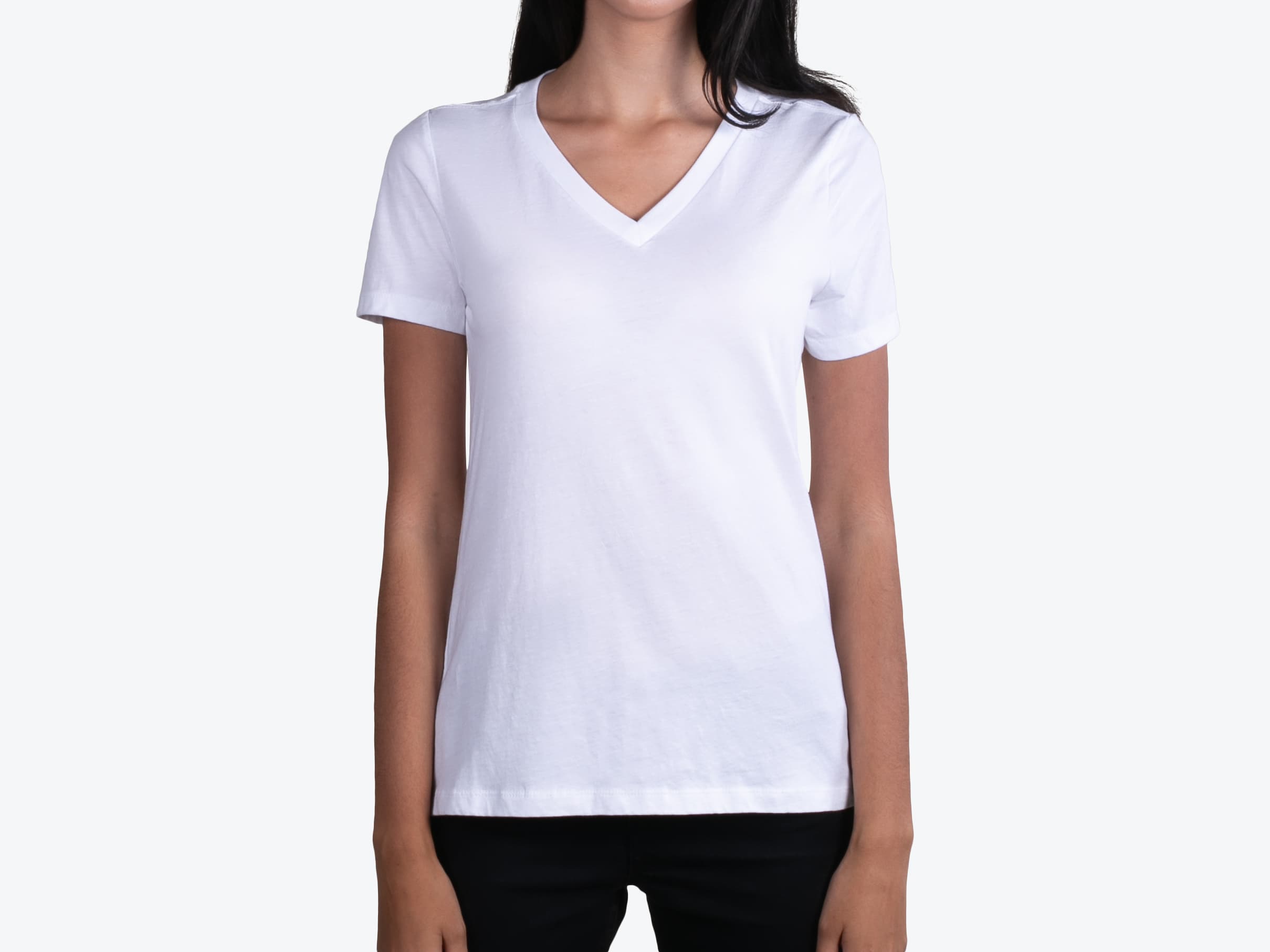 Bella+Canvas 6405 Women's Relaxed Jersey Short Sleeve V-Neck in White (model:female, size:small, view:front)