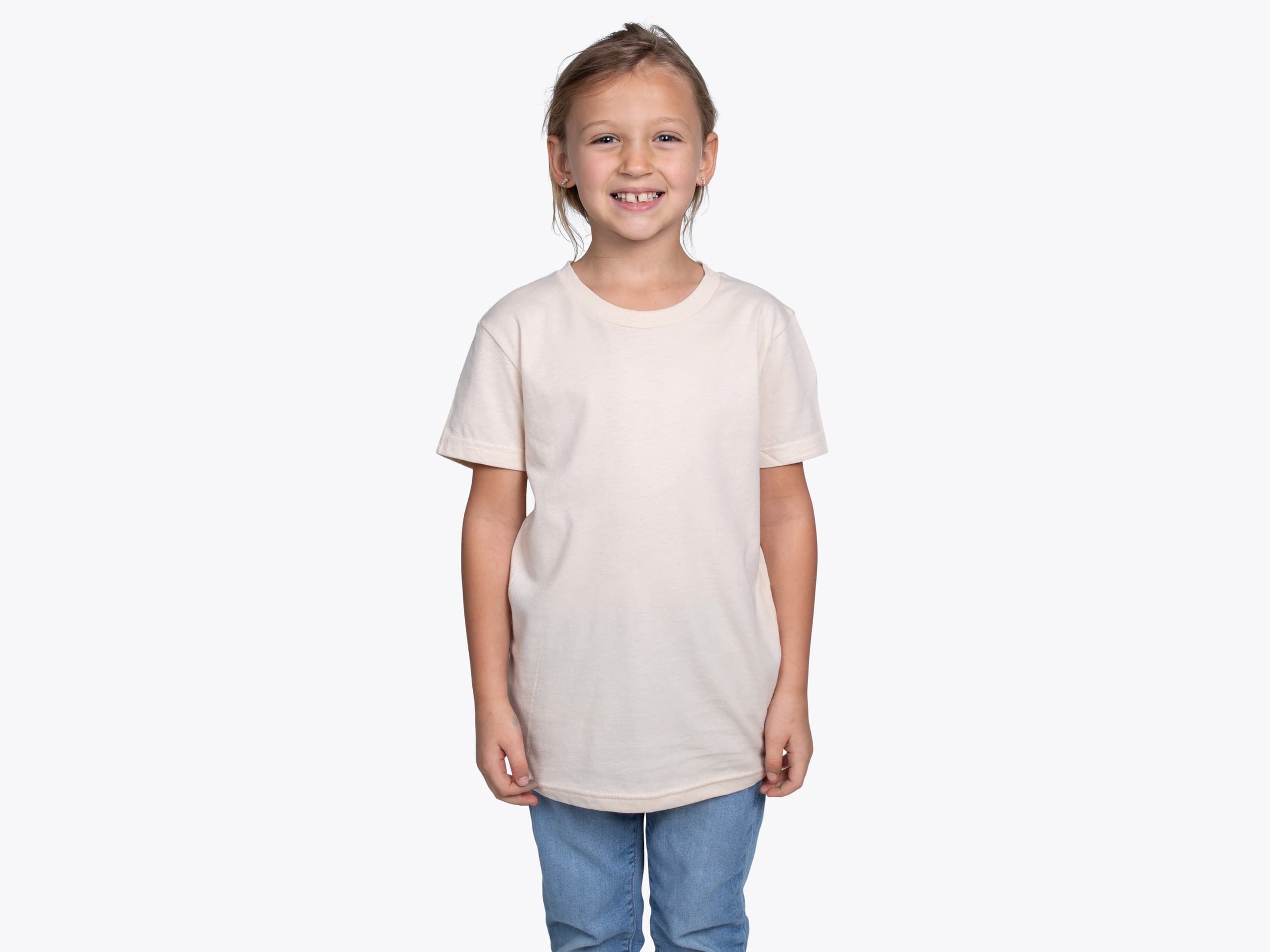 Bella+Canvas 3001Y Youth Short Sleeve Tee in Natural (model:girl, size:small, view:front)