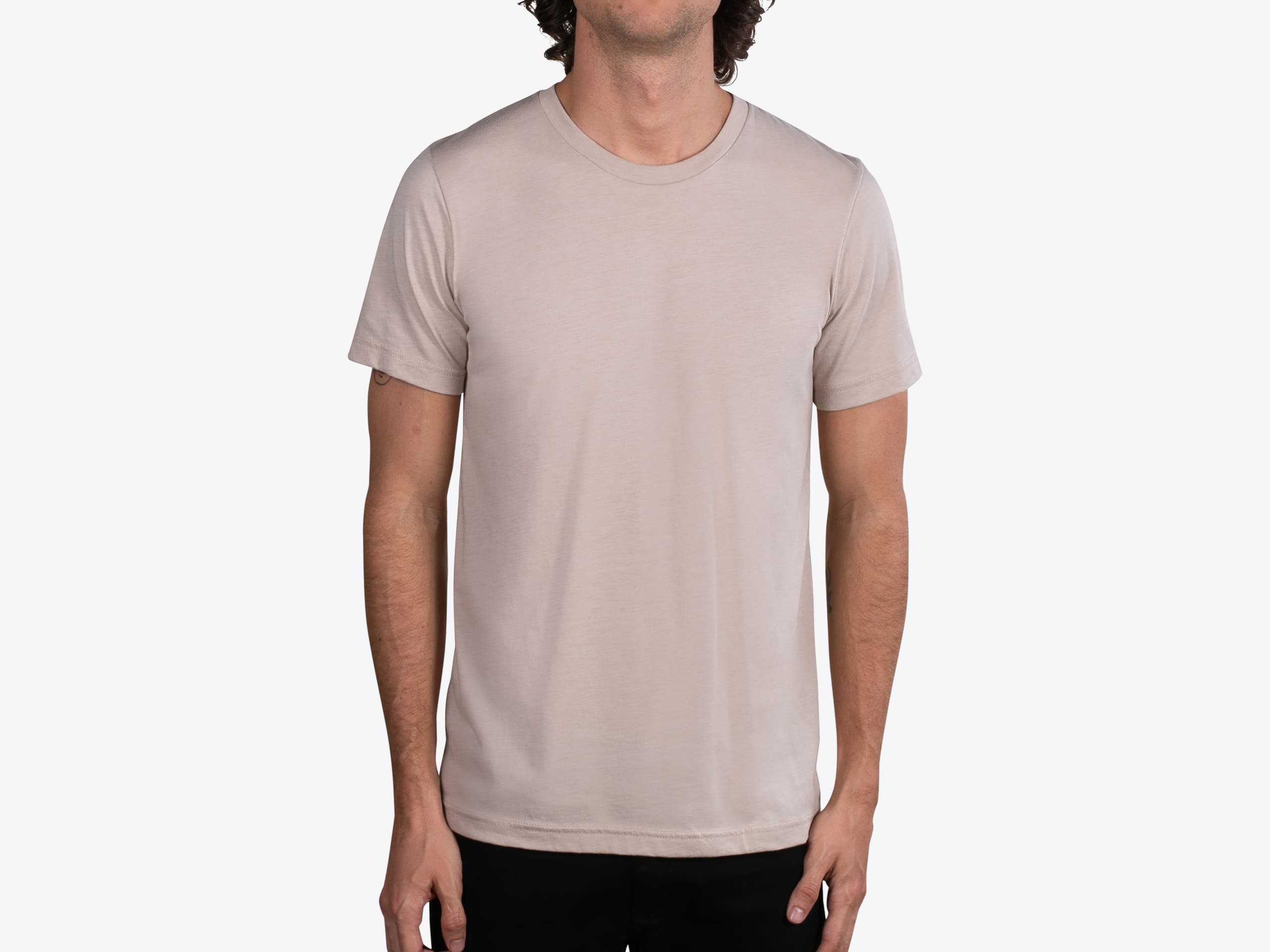 Bella+Canvas 3001CVC Unisex Heather CVC Short Sleeve Tee in Heather Tan (model:male, size:medium, view:front)