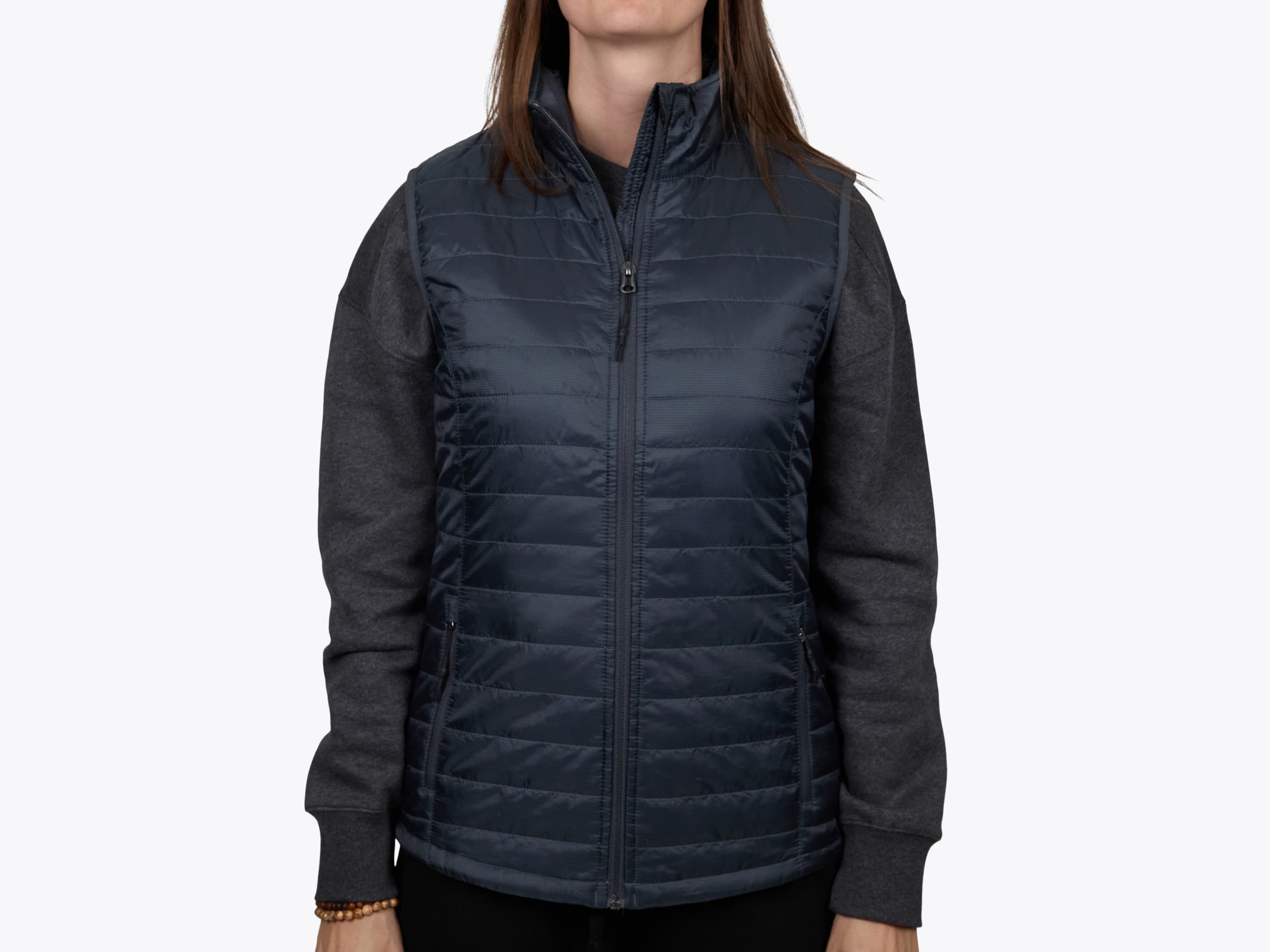 Port Authority L851 Ladies Packable Puffy Vest in Sterling Grey/Graphite (model:female, size:small, view:front)